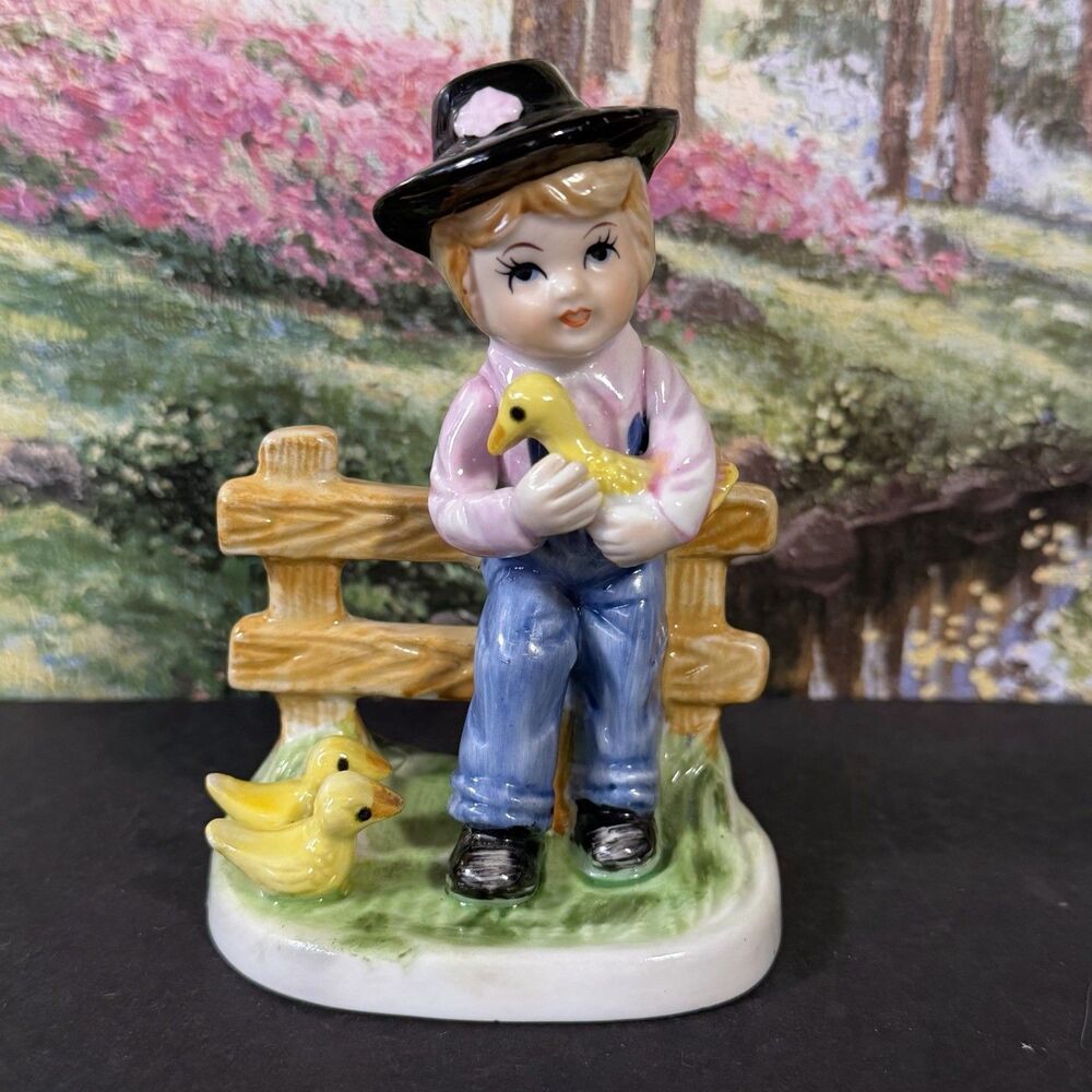 Vintage Porcelain Figurine Boy with Ducks Sitting on Wooden Fence